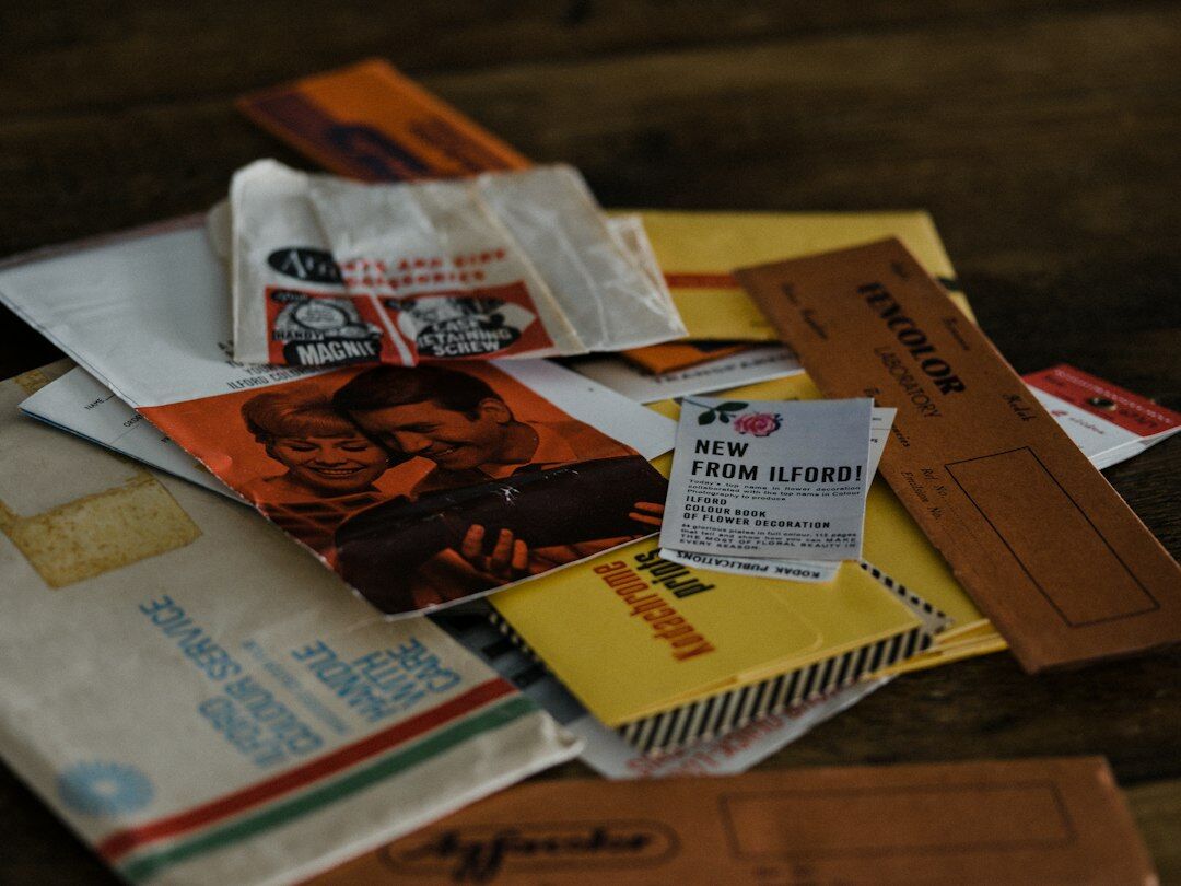 Curated flatlay of vintage magazines, gloves and archival ephemera